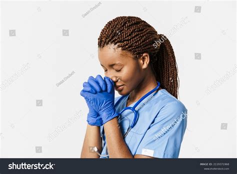 Young Black Doctor Wearing Uniform Making Stock Photo (Edit Now) 2119371968