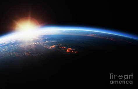 Sunrise Over Planet Earth by Tetra Images