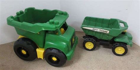 2 Plastic John Deere Dump Trucks Albrecht Auction Service