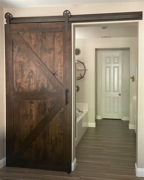 Knotty Alder Arrow Brace Barn Door With Our Traditional Hardware Barn