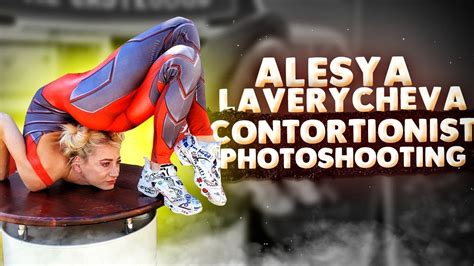 Contortionist photoshooting. Flexshow. Extremely flexibility poses