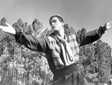 Shammi Kapoor in a black and white still from Dil Deke Dekho 1958.