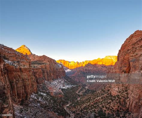 View From Canyon Overlook Into Zion Canyon With Snow At Sunrise Back