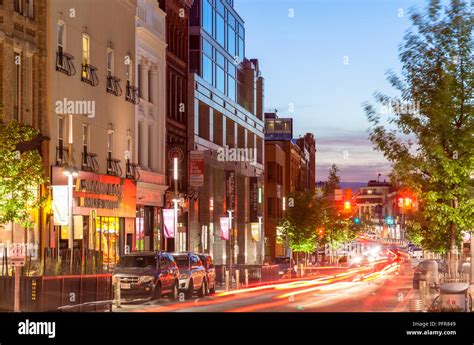 Historical buildings along King Street West at dusk in downtown ...