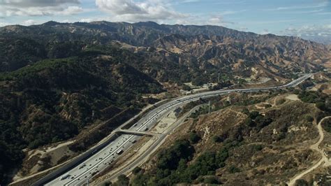 76k Stock Footage Aerial Video Flying Over I 5 With Light Traffic