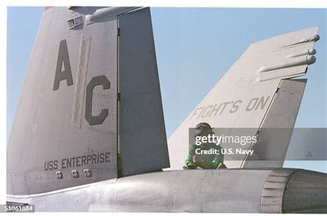 Aboard USS Enterprise -- A Crewman Of The USS Enterprise , Prepares... News Photo - Getty Images