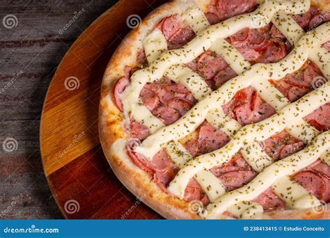 Pepperoni Pizza With And Catupiry Cheese On Wooden Background In