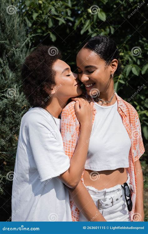 Curly African American Woman Kissing Cheek Stock Image Image Of Curly