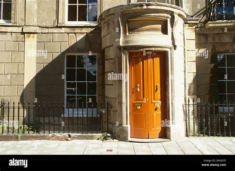 Large Georgian townhouse with curved double doors and porch Stock Photo - Alamy