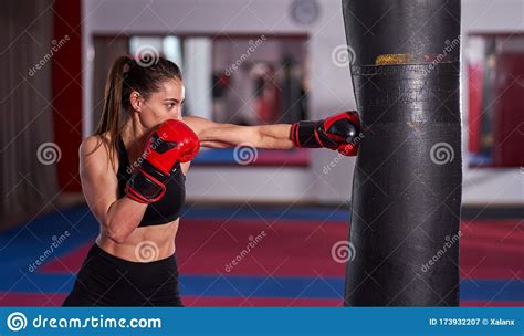 Boxer Girl Hitting The Heavy Bag Stock Image Image Of Punchbag Activity 173932207