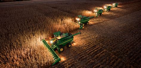 John Deere Combines In The Field