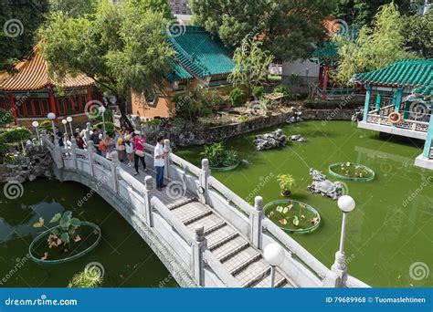 People At A Bridge At The Wong Tai Sin Temple Editorial Stock Photo