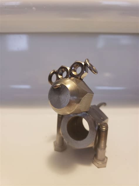 Nut and Bolt Dog | Bolt dog, Consignment shops, Welding art projects