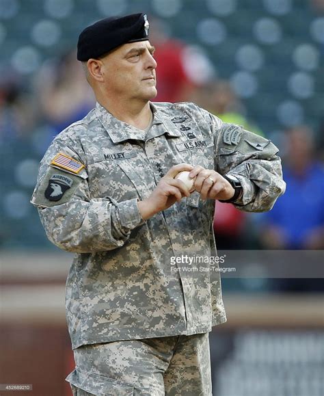 U.S. Army Lt. General Mark Milley throws out a ceremonial first pitch ...