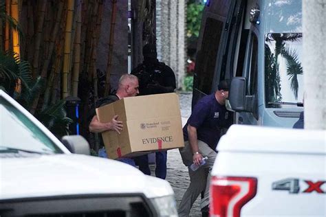 Law Enforcement Officers Raid Sean Combs Star Island Home In Miami