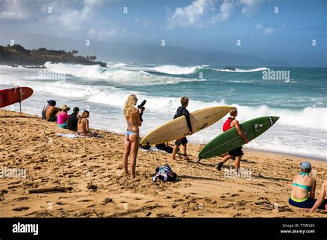 Hawaii Oahu North Shore Surfers At Waimea Bay Stock Photo Alamy