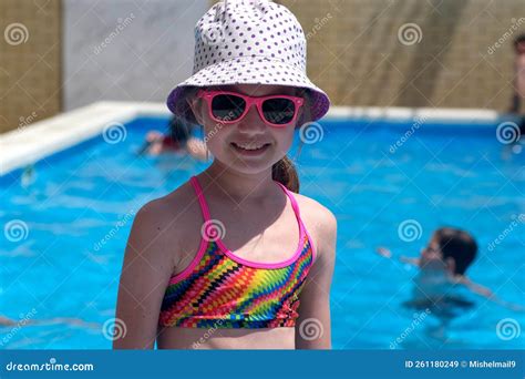 Smiling Kid Girl on Background of Swimming Pool on Sunny Day. Summer ...