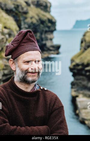 A Faroe islander wearing a traditional Faroese wool sweater and hat in ...