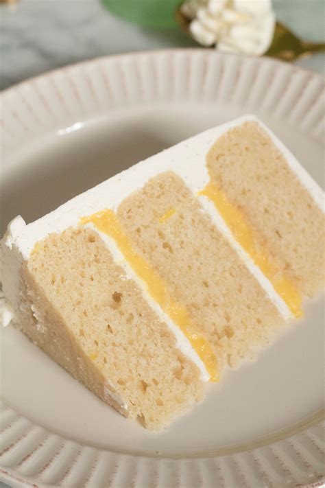 Triple Layered Vanilla Cake Lemon Curd And Italian Buttercream Filling