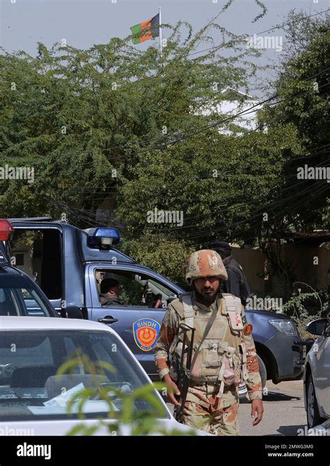 A Pakistani Paramilitary Soldier Stands Guard Outside The Afghan