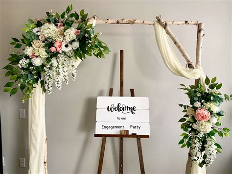 Wedding Arch Arrangement With Blush And White Silk Flowers Swag