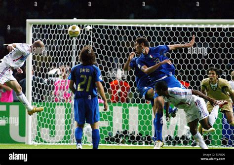 France S Zinedine Zidane On The Left Heads The Ball Toward The