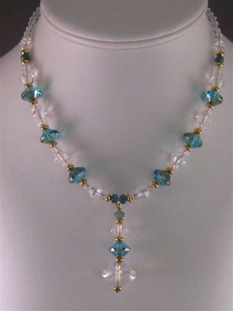 Teal Green And Clear Ab Czech Crystal Bicones And Rondels With Gold