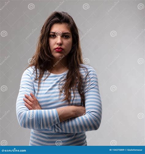 Young Woman with a Deadpan Stern Expression Stock Image - Image of ...