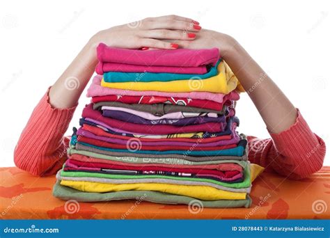 Heap Of Arranged Clothes Stock Photos - Image: 28078443