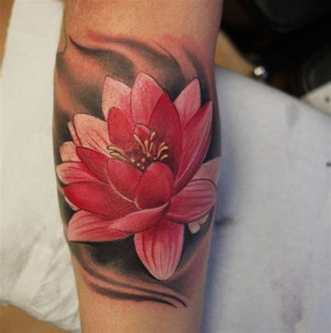 Pretty pink lotus flower on black background tattoo on arm ...