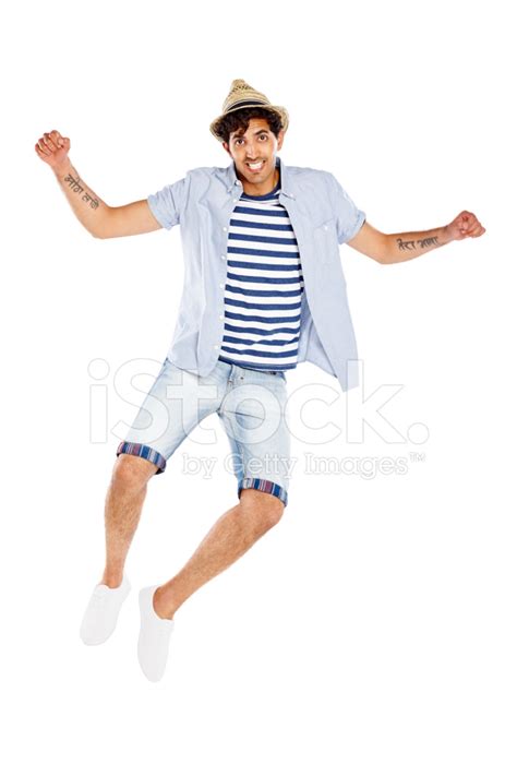 Excited Young Man Jumping In Joy Stock Photo | Royalty-Free | FreeImages