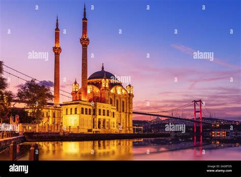 Ortakoy Mosque And The Bosphorus Bridge In The Night Lights Istanbul