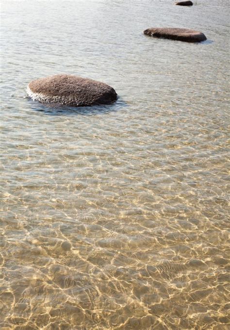 Stones In Shallow Water Stock Photo Image Of Boulder