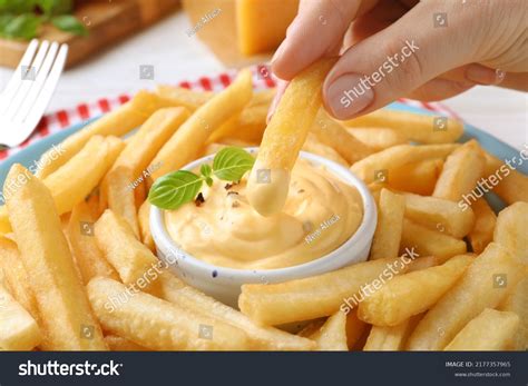 Woman Dipping Delicious French Fries Into Stock Photo 2177357965