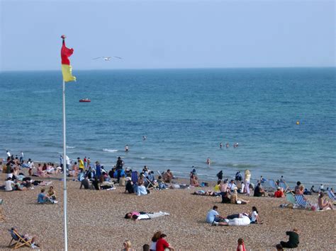 Free Stock photo of Tourists Relaxing at Beautiful Brighton Beach