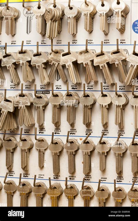 Blank Keys Hanging In A Locksmiths Shop Stock Photo Alamy