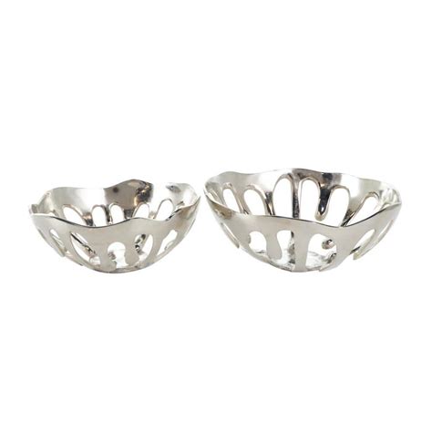 Litton Lane Silver Aluminum Drip Decorative Bowl With Melting Designed