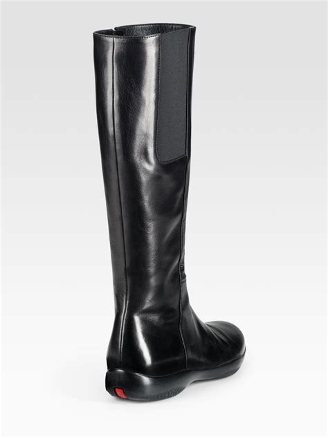 Prada Tall Flat Boots In Black Lyst