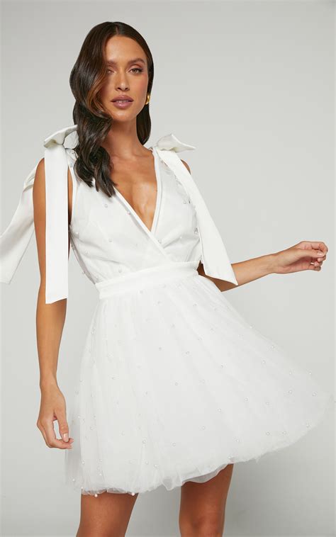 Karalyn Mini Dress Bow Strap Plunge Pearl Detail Dress In White