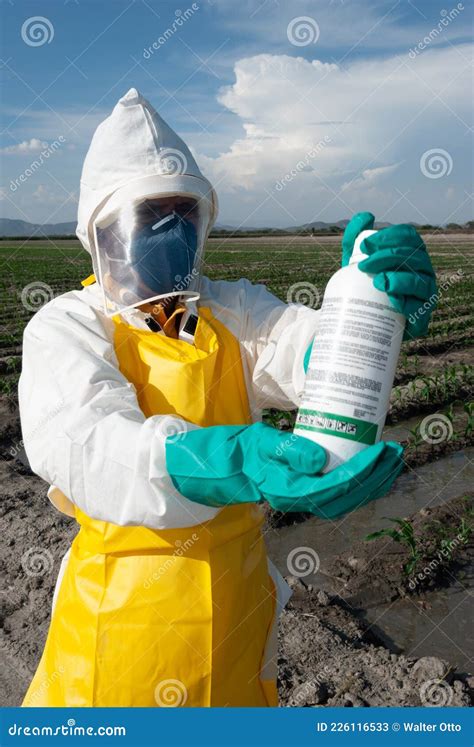 Personal Protective Equipment For Pesticide Handling In The Field Stock