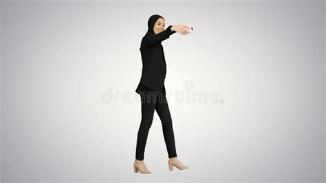 Smiling Arab Woman In Hijab Taking Selfies On Her Mobile Phone A Stock