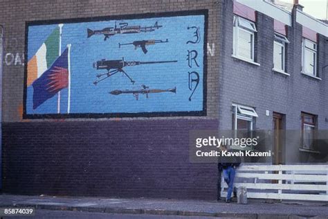 A Young Man Stands Under A Pro Ira Mural In A Loyalist Republican