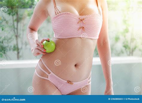 Portrait Asia Woman Wear Lingerie Or Underwear With Green Apple Holding