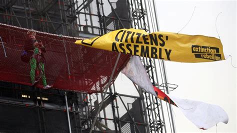 Extinction Rebellion Protester Climbs Big Ben As Police Call On Him To