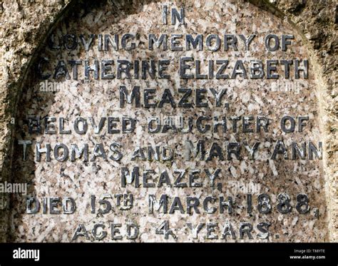 Headstone With Raised Letters Marking The Burial Place Of Mebers Of The