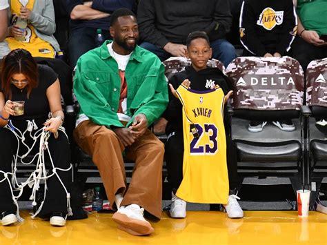 Dwyane Wade Steps Out With His Youngest Son Xavier For A Lakers Game ...