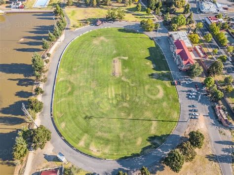 Image Of Aerial View Of A Road Surrounding A Football Oval And