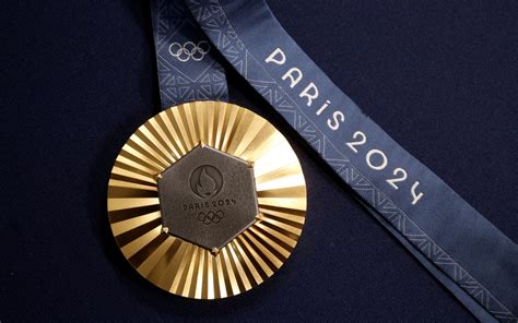 Medallas De Olimpiadas París 2024 Llevarán Pedazo Original De Torre