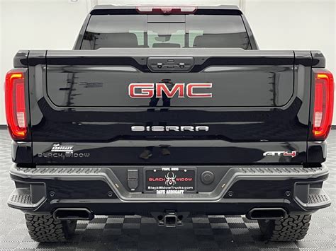 New 2023 Gmc Sierra 1500 At4 Black Widow Lifted Truck 4d Crew Cab In Troy Lg16710 Dave Arbogast