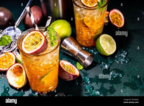 Sweet Colorful Tropical Cocktail With Passion Fruit Lime And Mint